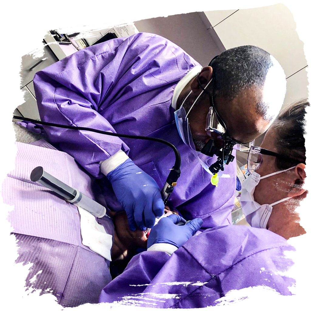 Dr. Gerald Glenn at work in the Glenn Smile Center dental office, exemplifying the diligence and expertise in patient oral health care.