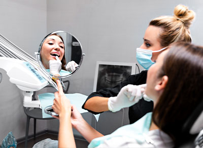 Sophisticated tooth whitening care provided by Glenn Smile Center dentist.